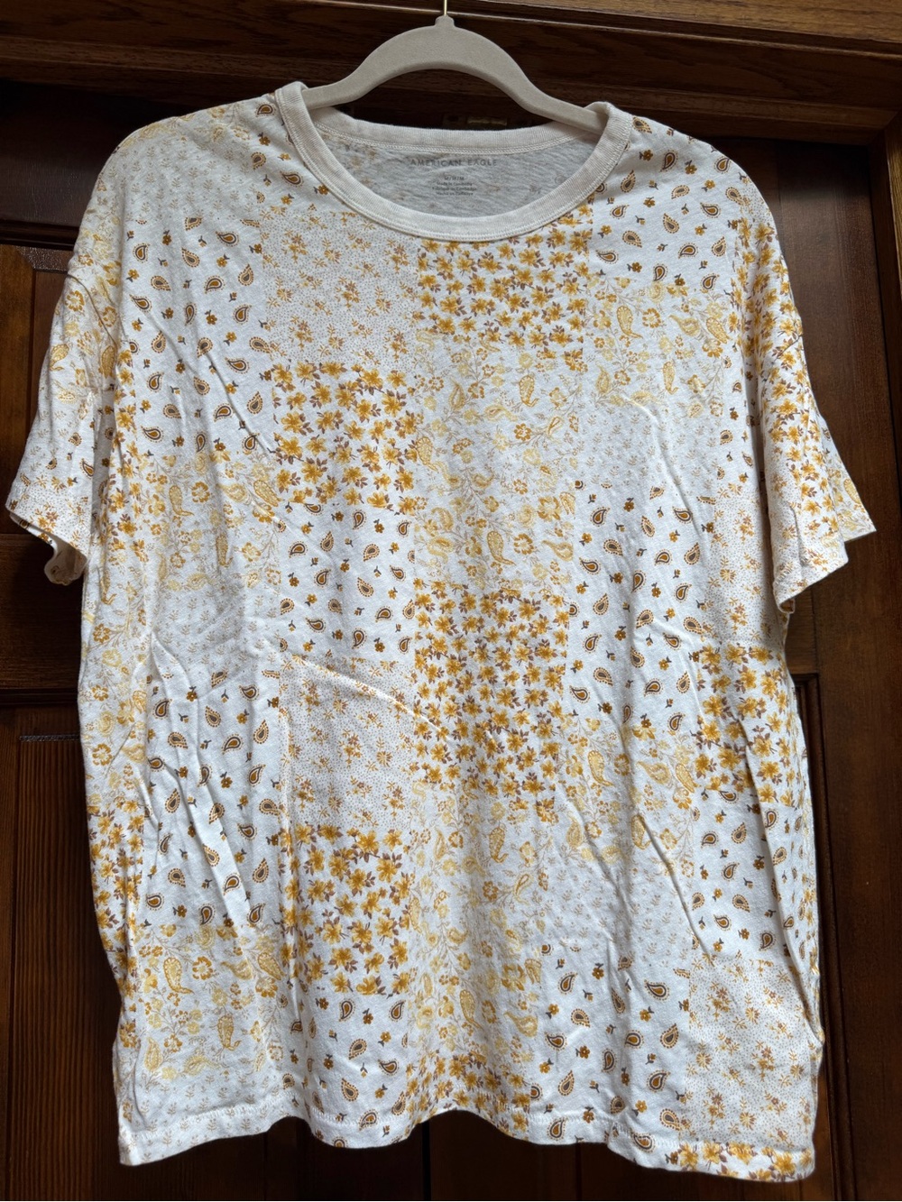 American Eagle Outfitters White Tee with Gold Floral/Paisley Print, Size Medium
